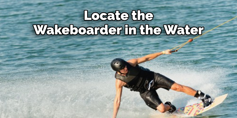 Locate the Wakeboarder in the Water