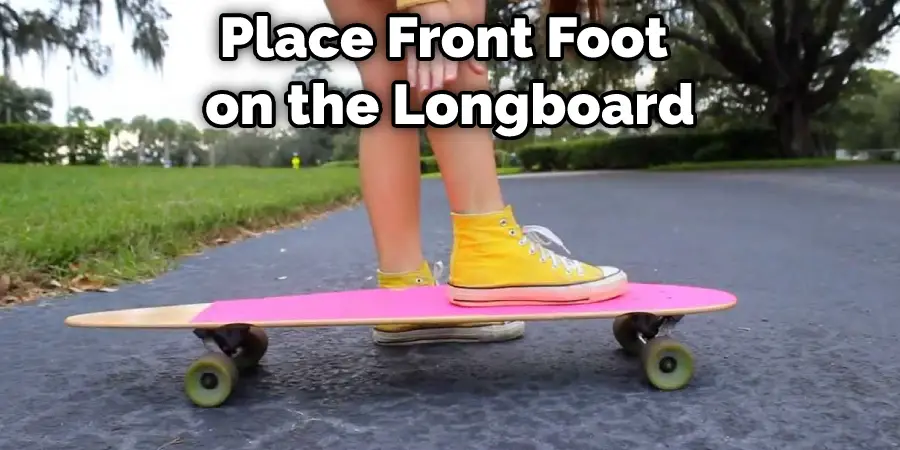 Place Front Foot on the Longboard