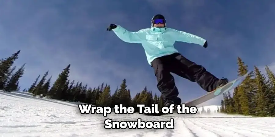 Wrap the Tail of the  Snowboard